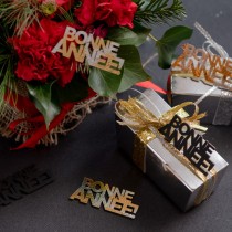 10 CONFETTIS BOIS ANNÉE CHAMPAGNE 6.5X2.7CM NOIR