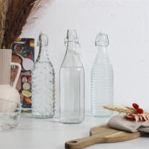 BOUTEILLE VERRE À CLAPET EMBOSSÉ 1L TRANSPARENT